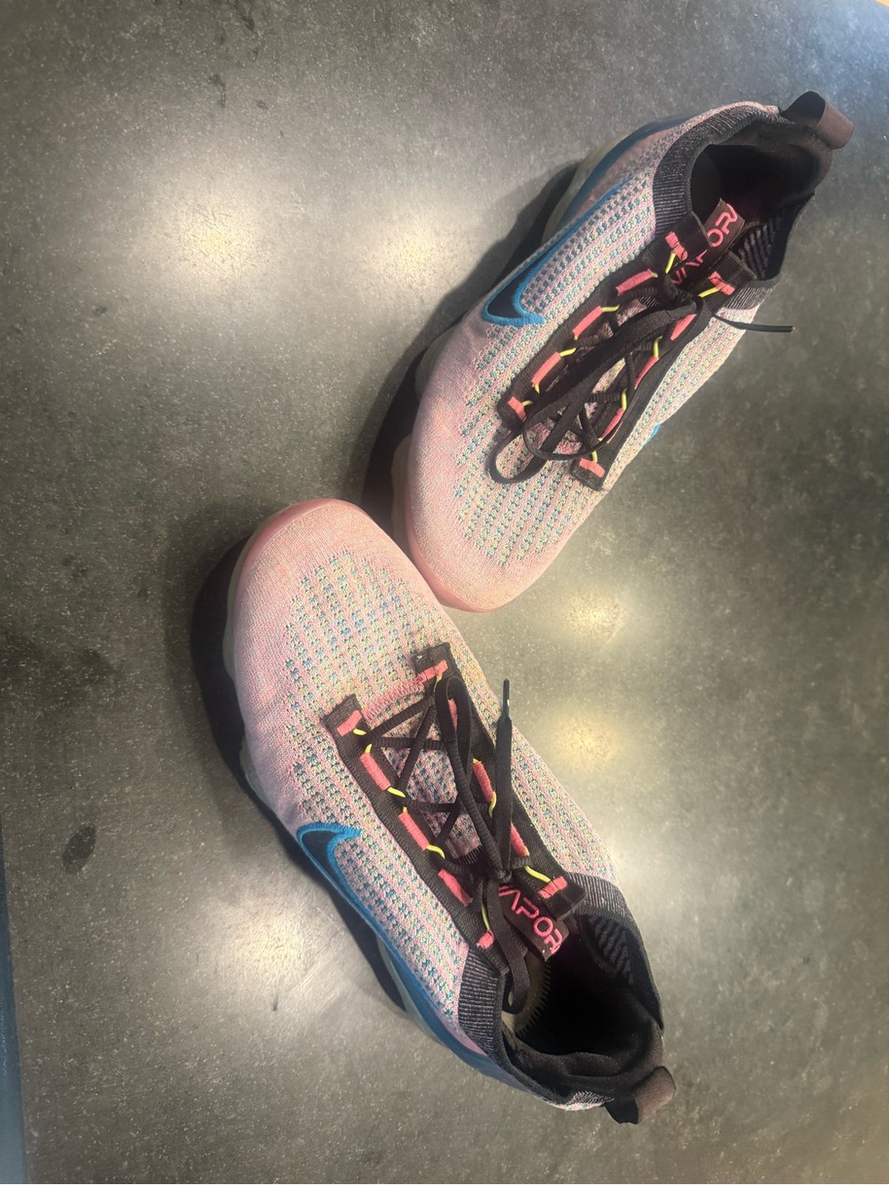 Nike Air VaporMax 2021 Flyknit sneakers in the "Pink Blast Photo Blue" colorway.